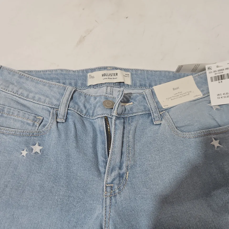 HOLLISTER BOOT LOW-RISE JEANS IN BLUE - W28 REG