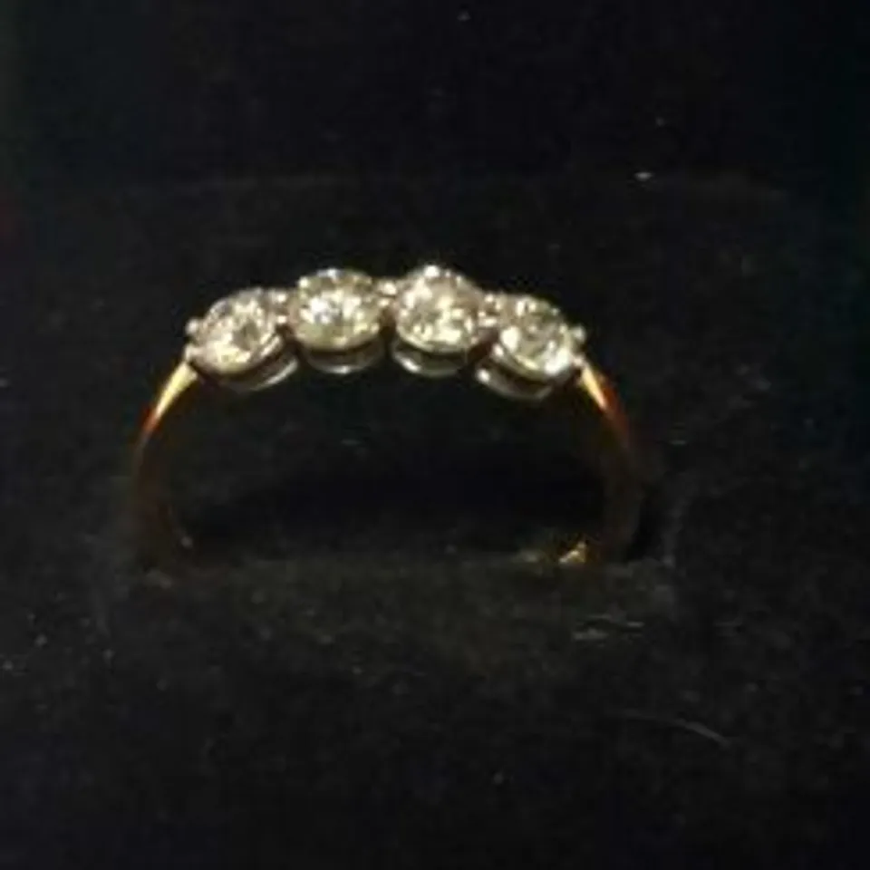 18CT GOLD FOUR STONE HALF ETERNITY RING SET WITH DIAMONDS WEIGHING +0.64CT