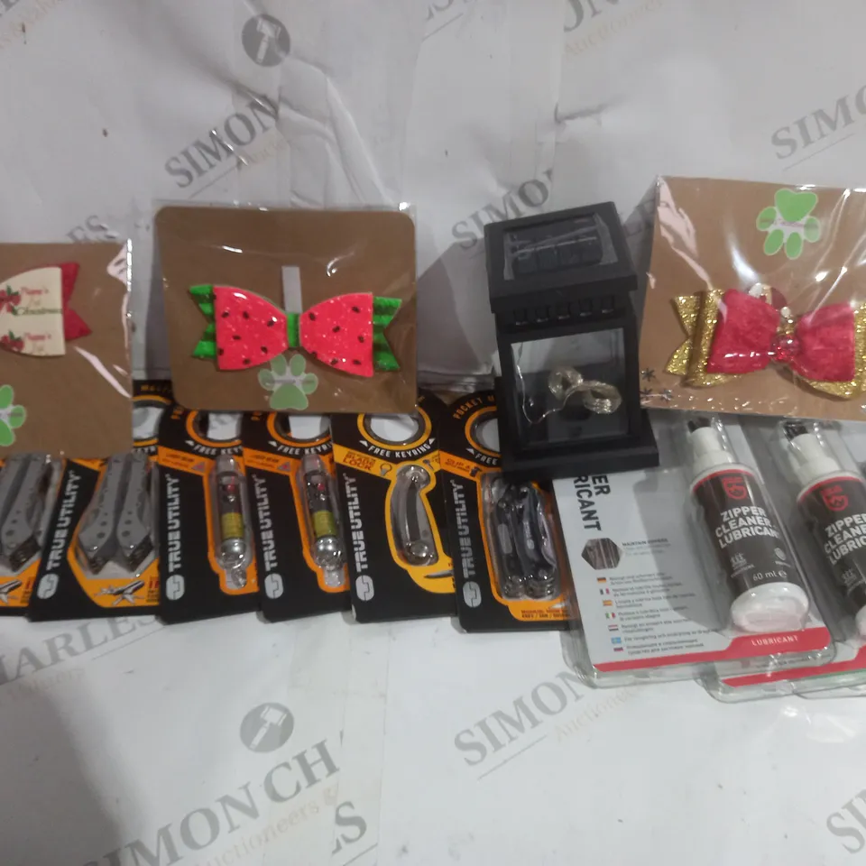 APPROXIMATELY 20 ASSORTED HOME ITEMS INCLUDING ZIPPER LUBRICANT, POCKET KNIFE OR MINI TOOL, DOG COLLAR BOW TIES