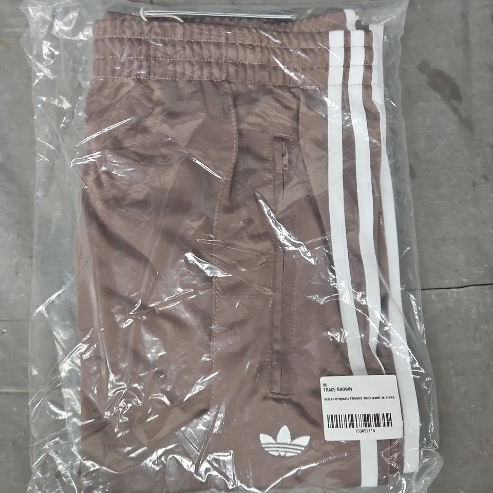 ADIDAS FIREBIRD TRACK PANTS IN BROWN SIZE MEDIUM