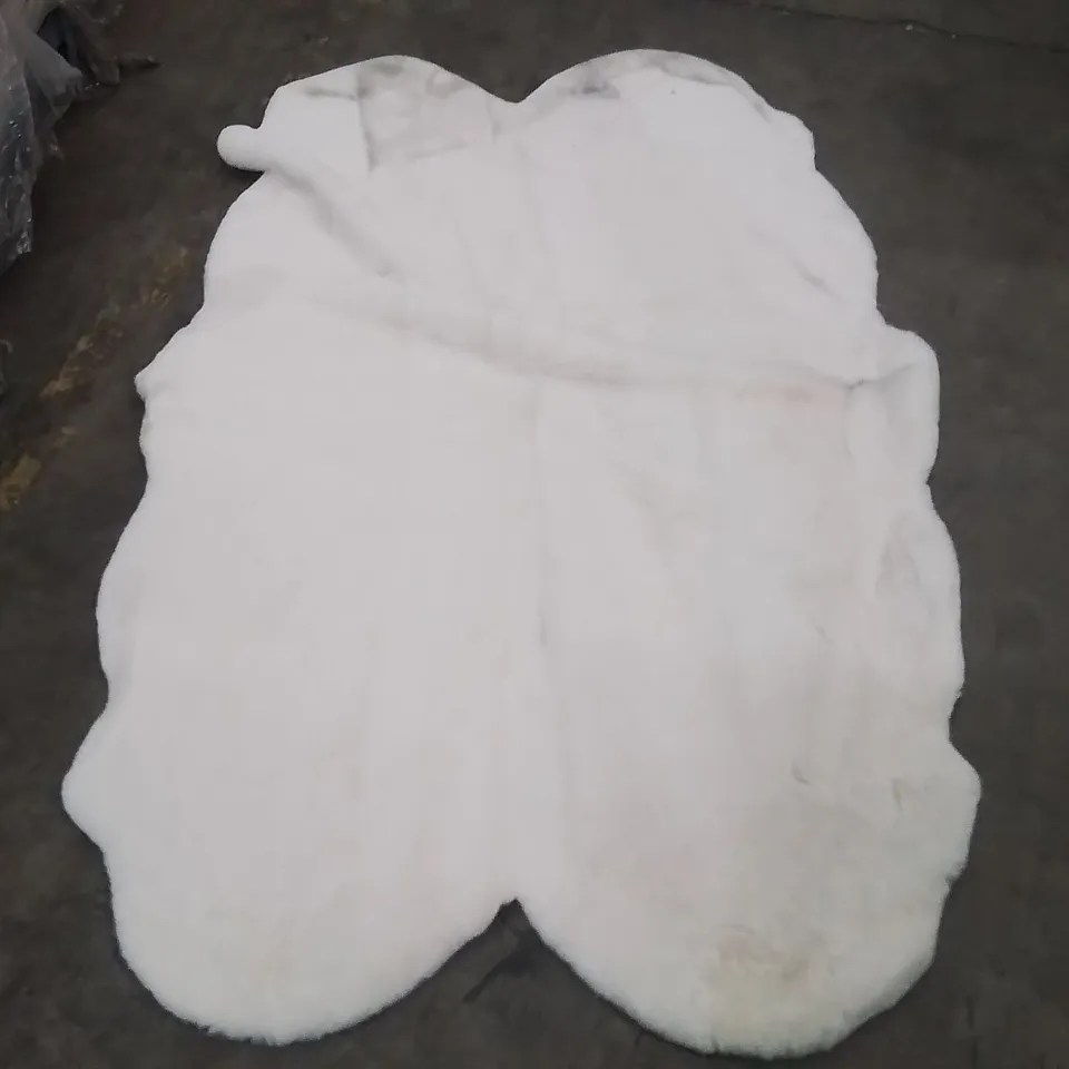 STILLAGE OF APPROXIMATELY 20 QUALITY DESIGNER RUGS