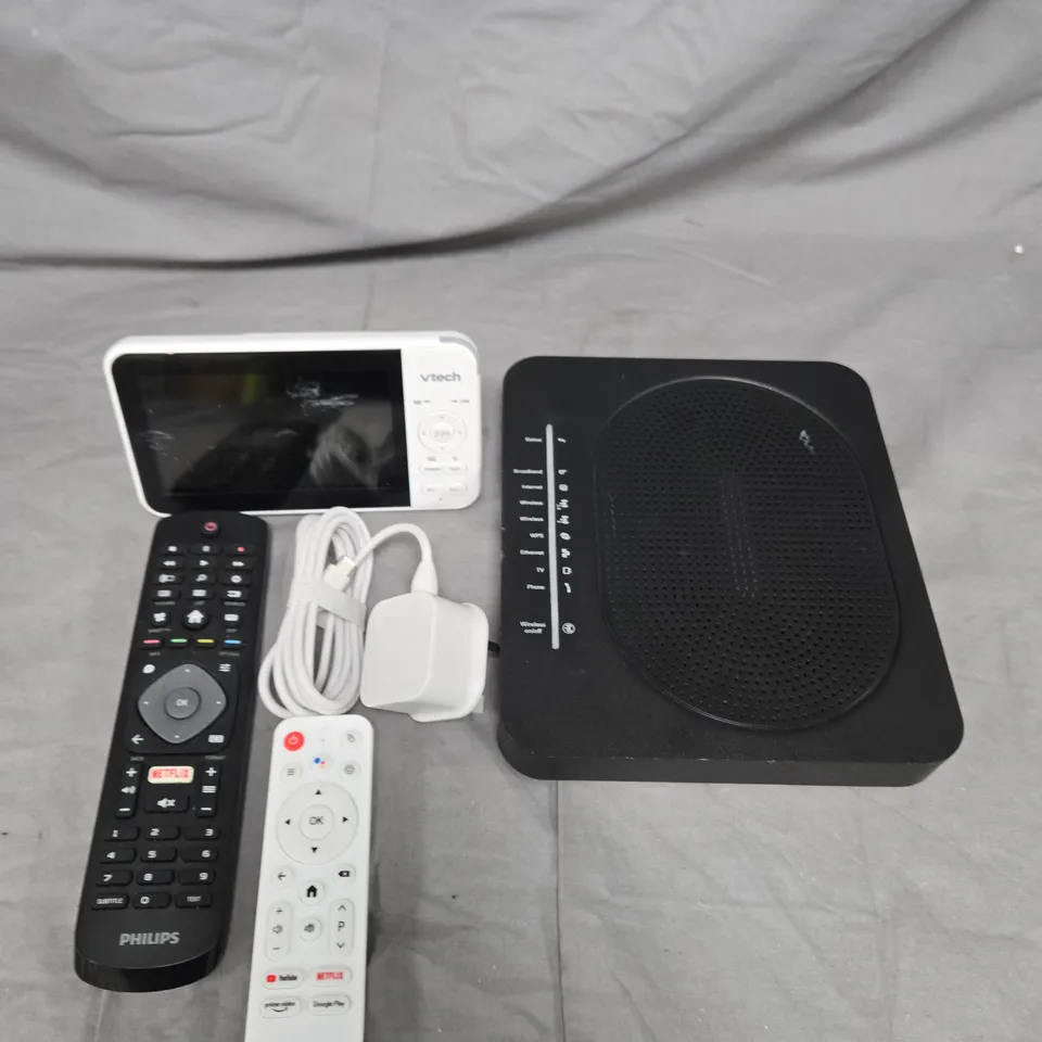 APPROXIMATELY 20 ELECTRICAL ITEMS TO INCLUDE - REMOTE CONTROLS, WIFI HUB AND POWER ADAPTERS