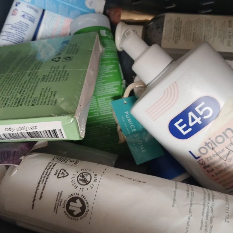 APPROX 12 ASSORTED BEAUTY PRODUCTS TO INCLUDE TROPIC CLEANSER, COLGATE TOOTHPASTE, COTTON BALLS, ETC 