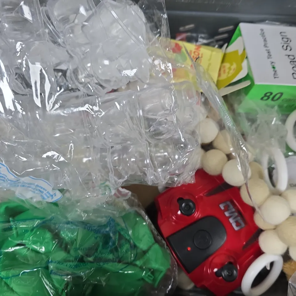 APPROXIMATELY 10 ASSORTED TOYS AND GAMES TO INCLUDE POCKET POP KEYCHAIN, POLICE BADGE, ETC