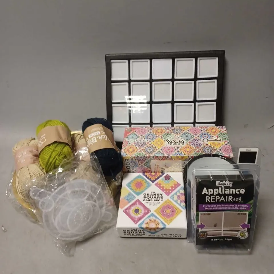 APPROXIMATELY 12 ASSORTED HOUSEHOLD ITEMS TO INCLUDE - GRANNY SQUARE CARD DECK - YARN - MAGICEZY APPLIANCE REPAIR - ETC