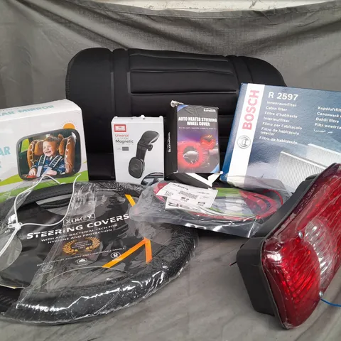APPROXIMATELY 20 ASSORTED ITEMS TO INCLUDE BABY CAR MIRROR, BOOT SEAL KIT, STEERING COVER, UNIVERSAL CAR HOLDER, BOSCH CABIN FILTER, HEATED STEERING WHEEL COVER, WIPER BLADES, AIR COMPRESSOR