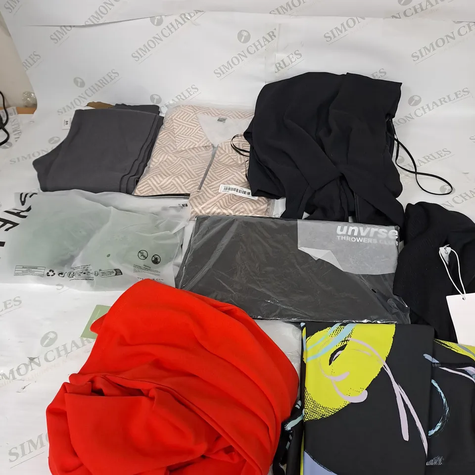 LARGE BOX OF ASSORTED CLOTHING ITEMS IN VARIOUS COLOURS AND SIZES INCLUDING TROUSERS , TOPS AND JUMPERS