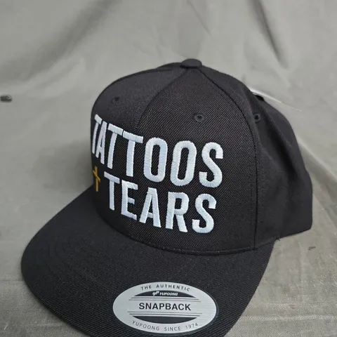 TATTOOS TEARS SNAPBACK CAP – BLACK