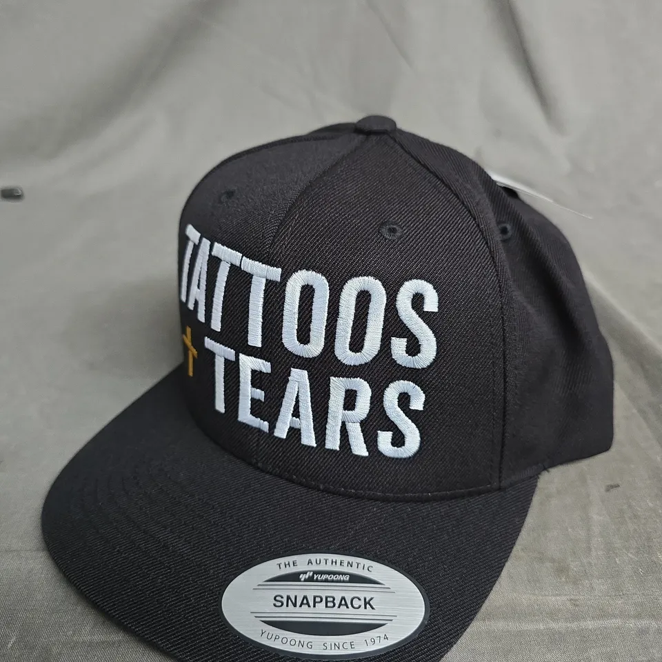 TATTOOS TEARS SNAPBACK CAP – BLACK