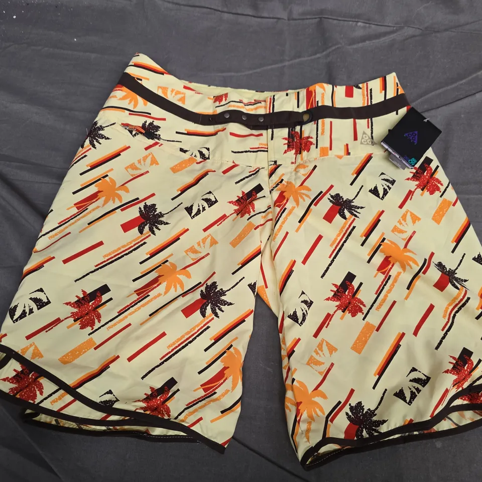NIKE ACG WOMEN’S LOW RISE PALM PRINT SHORTS – UK 8