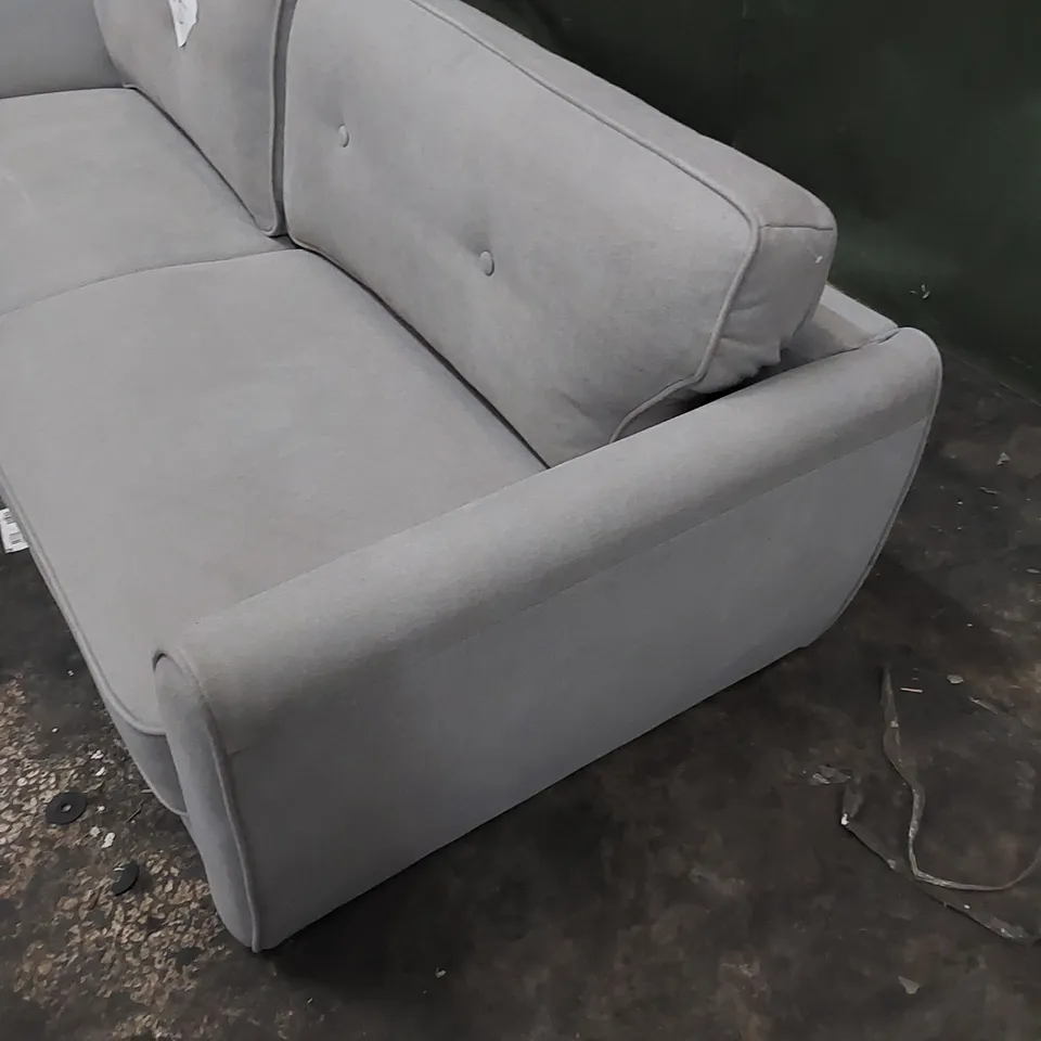 DESIGNER LARGE SOFA UPHOLSTERED IN FABRIC 