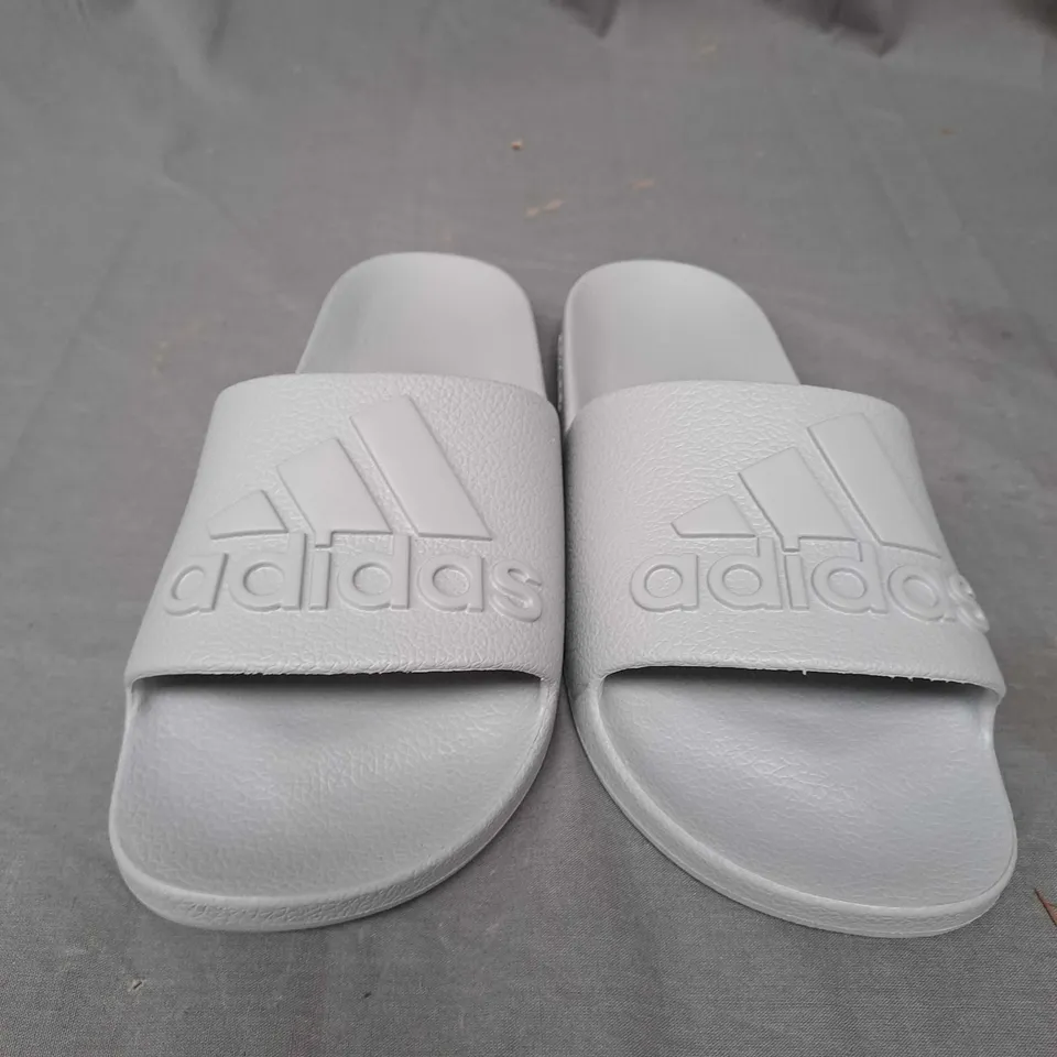 PAIR OF GREY ADIDAS SLIDES SIZE 9 