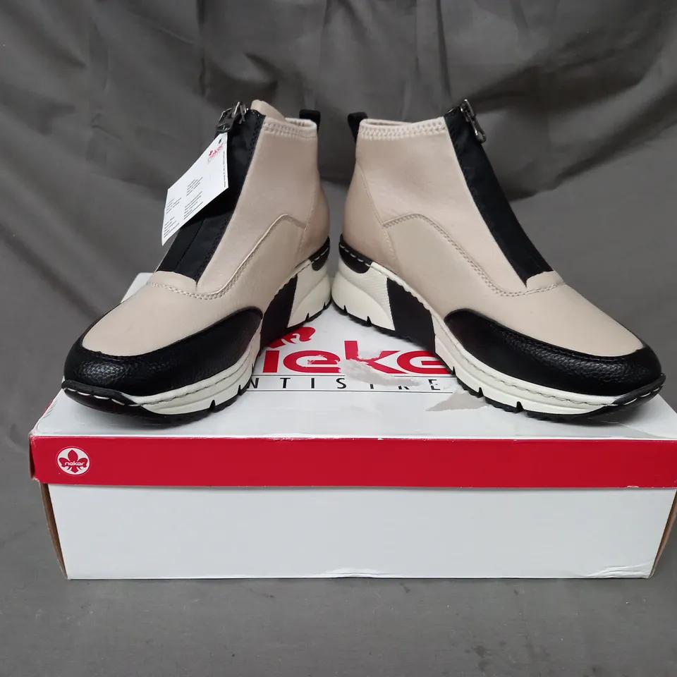 BOXED PAIR OF RIEKER HI TOP TRAINERS IN BEIGE SIZE 5