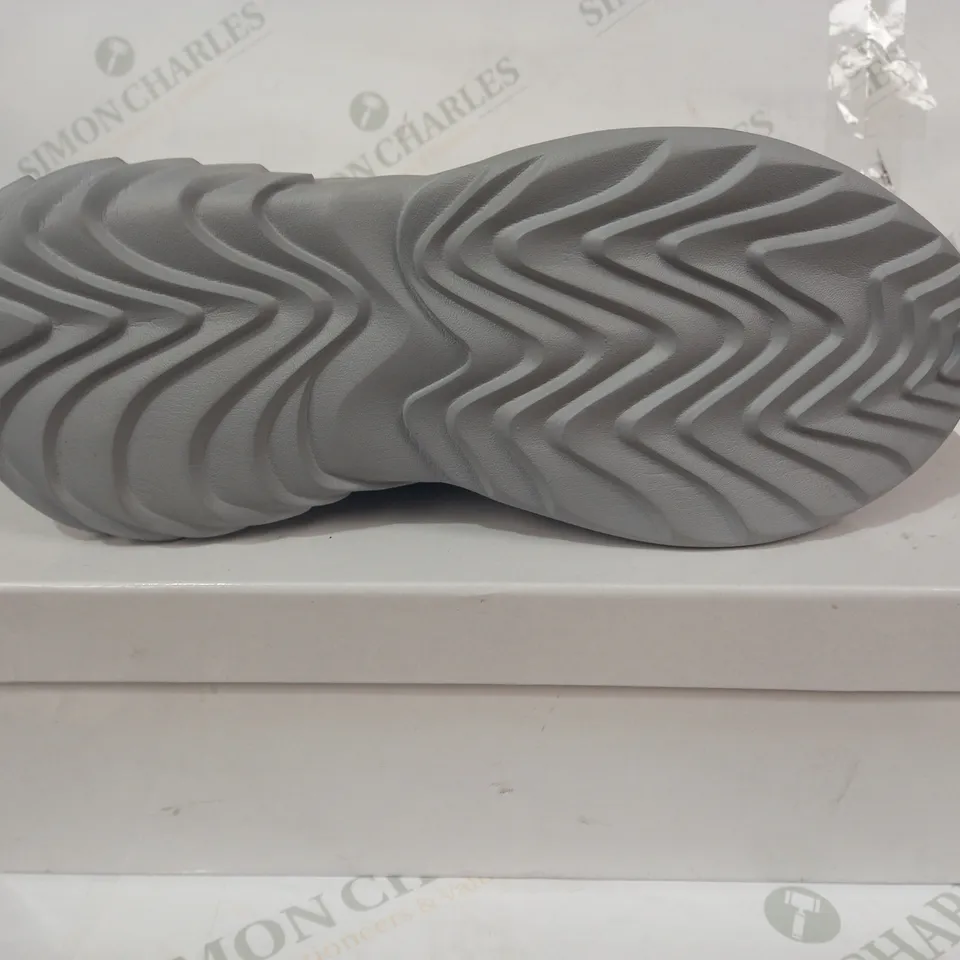 BOXED PAIR OF KOI VEGAN TRAINERS IN GREYSCALE SIZE UNSPECIFIED