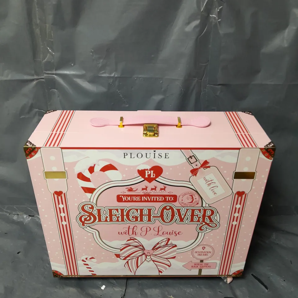 PLOUISE SLEIGH-OVER SUITCASE IN PINK