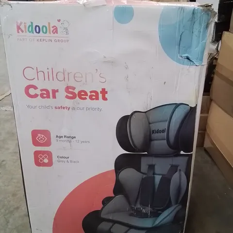 BOXED KIDOOLA CHILDREN'S CAR SEAT