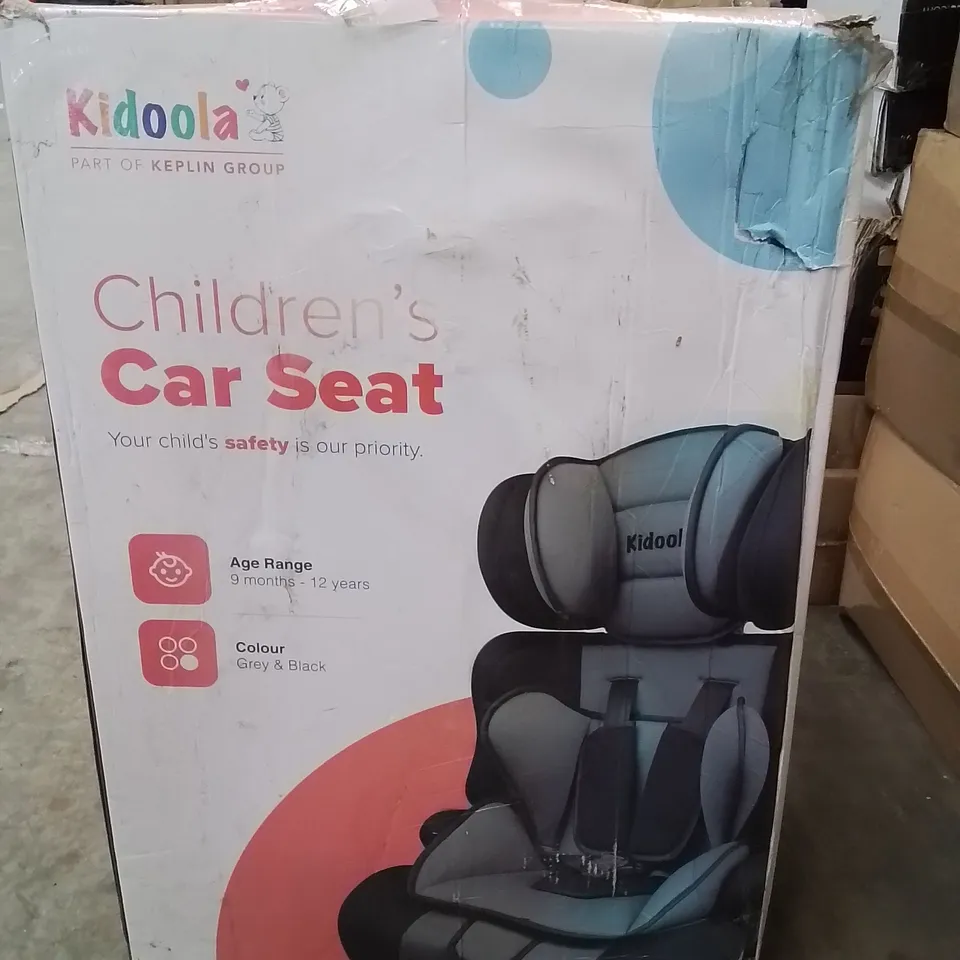 BOXED KIDOOLA CHILDREN'S CAR SEAT