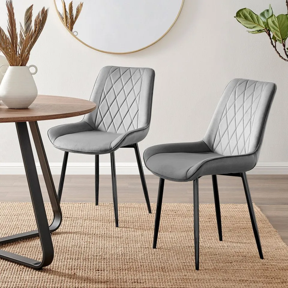 BOXED 4 PESARO DINING CHAIRS BLACK LEGS