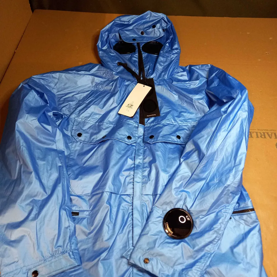 C.P. COMPANY NYBER IN LIGHT BLUE - SIZE MEDIUM