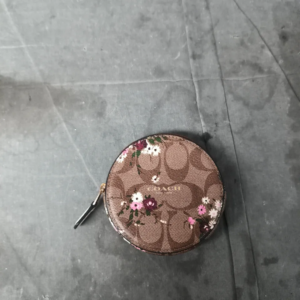 COACH CIRCLE COIN PURSE – BROWN SIGNATURE CANVAS WITH FLORAL PRINT (NEW YORK)