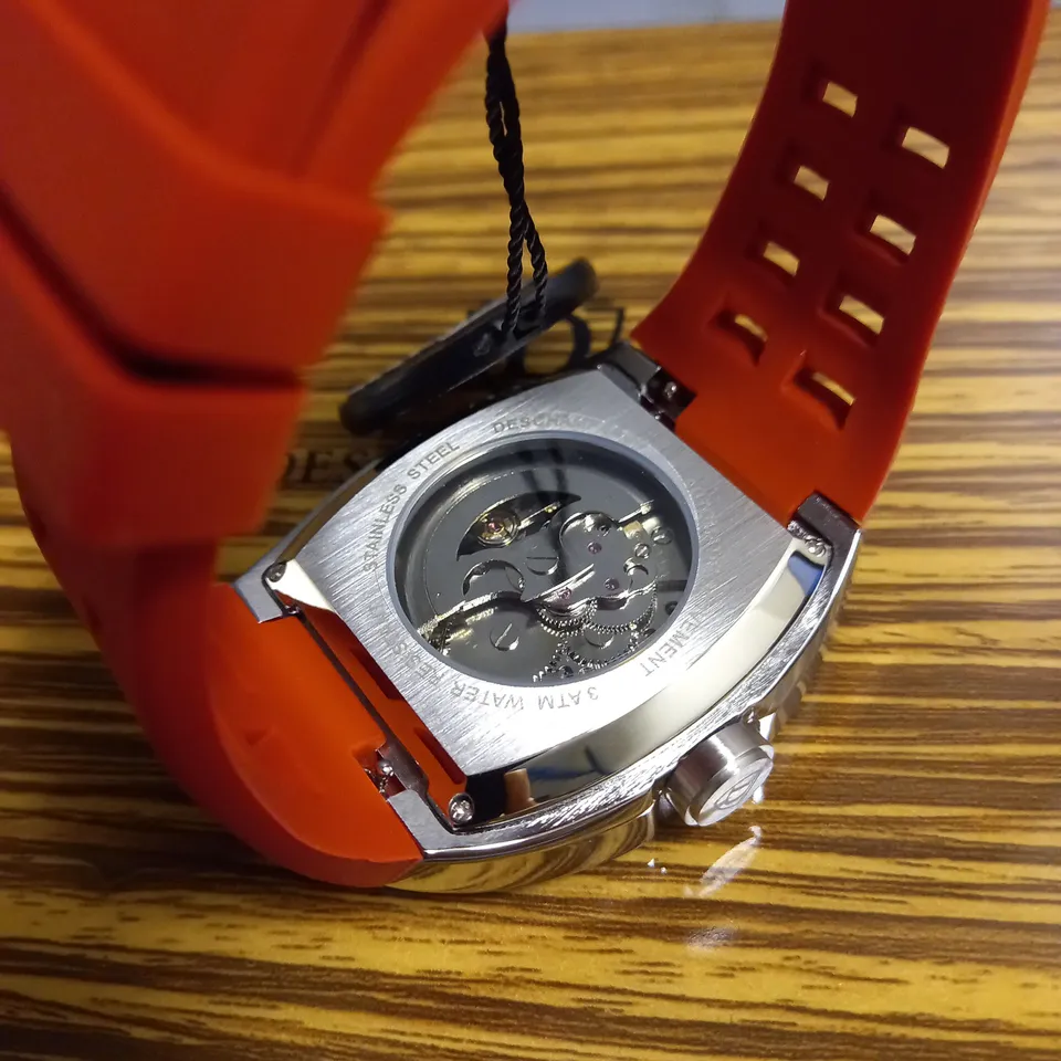 DESCHAMPS & CO MENS SILVER WATCH WITH SKELETON DIAL GLASS EXHIBITION BACK CASE AND RED RUBBER STRAP