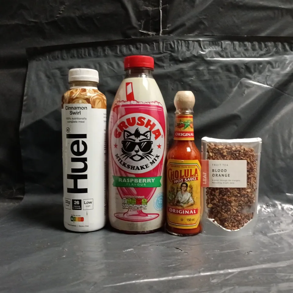 APPROXIMATELY 10 ASSORTED FOOD AND DRINK ITEMS TO INCLUDE HOT SAUCE, HUEL, BLOOD ORANGE FRUIT TEA, ETC