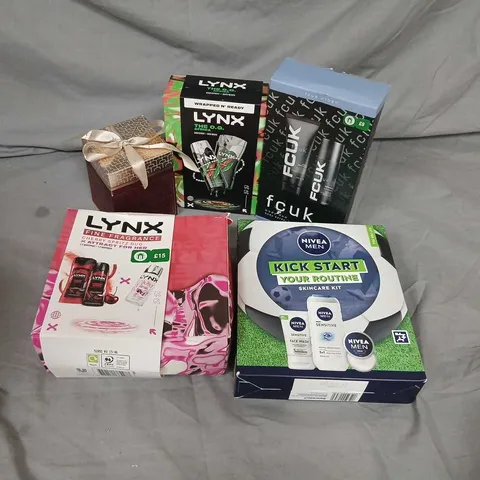 FIVE ASSORTED COSMETIC GIFT SETS TO INCLUDE; LYNX, FCUK AND LAMER