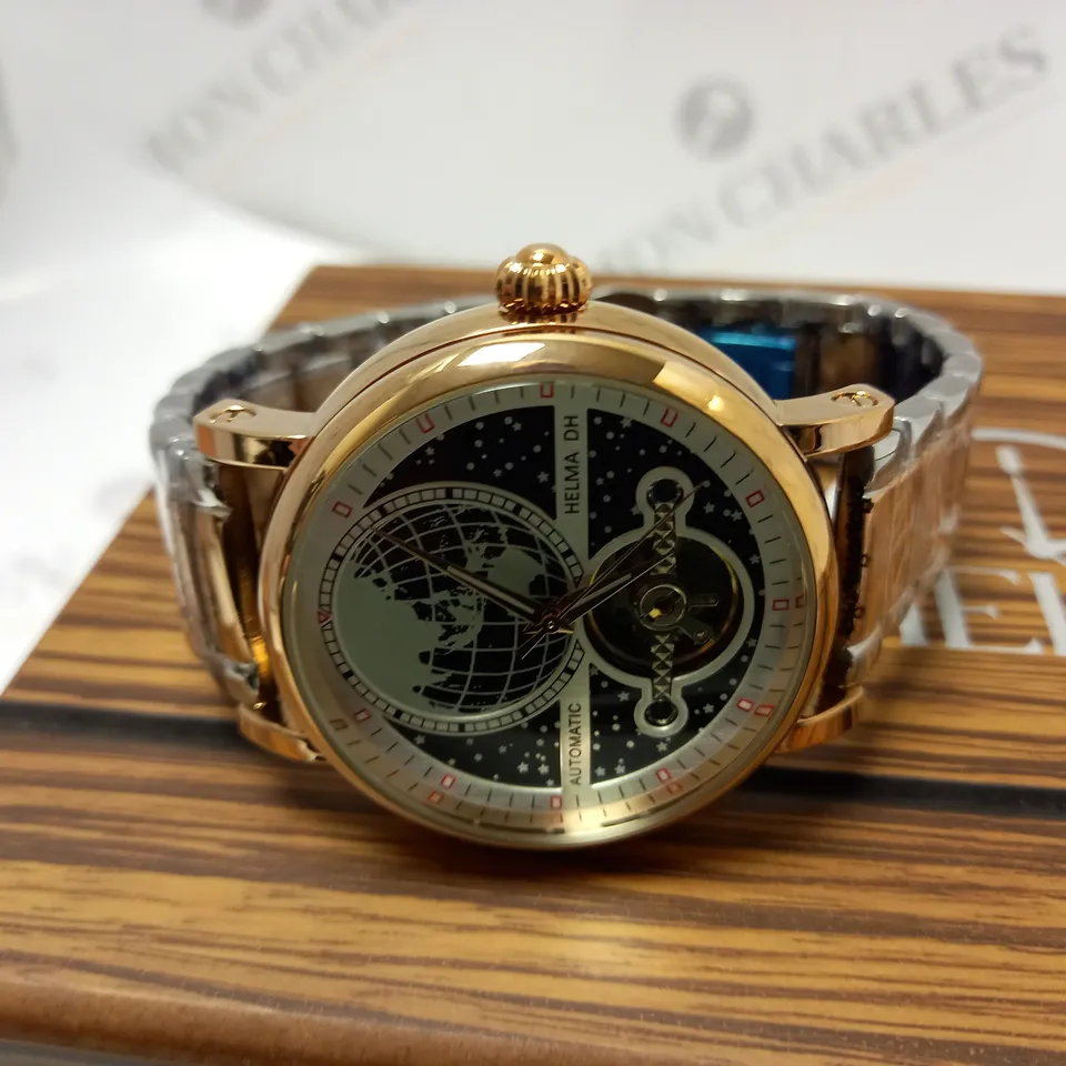 MEN’S HELMA DH AUTOMATIC WORLD VIEW WATCH – TOURBILLON MOVEMENT – BLUE DIAL – STAINLESS STEEL STRAP – GLASS EXHIBITION BACK CASE – LEATHER STRAP INCLUDED