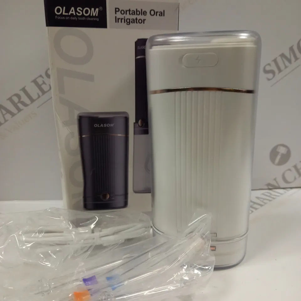 BOXED OLASOM PORTABLE ORAL IRRIGATOR 