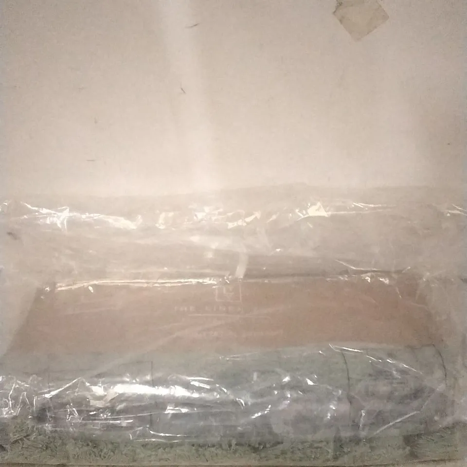 PACKAGED THE LINEN YARD RIBBED TASSEL BATH MAT - GREEN 