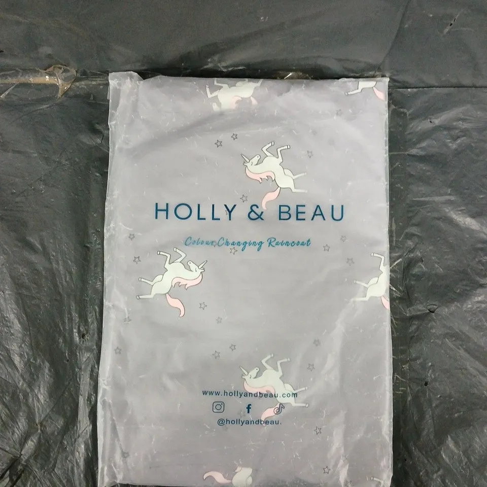 HOLLY & BEAU COLOUR CHANGING  UNICORN RAINCOAT – AGE 7-8