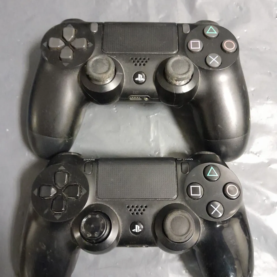 SET OF 2 PLAYSTION 4 CONTROLLERS 