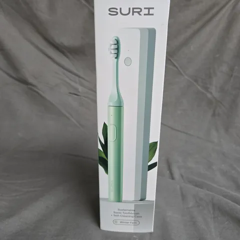 SEALED SURI SONIC TOOTHBRUSH IN WINTER FERM