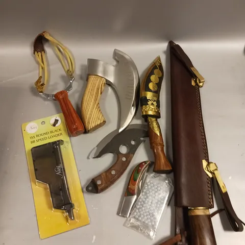 APPROXIMATELY 10 ASSORTED SPORTS/HOBBY PRODUCTS TO INCLUDE MAGAZINES, SLING SHOT, BB'S ETC - COLLECTION ONLY