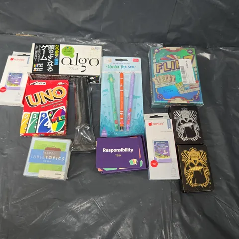 TOTE OF ASSORTED TOYS AND ACCESSORIES TO INCLUDE; UNO WILD CARDS, ALGO, TONIES AUDIO BOOK AND PLAYING CARDS