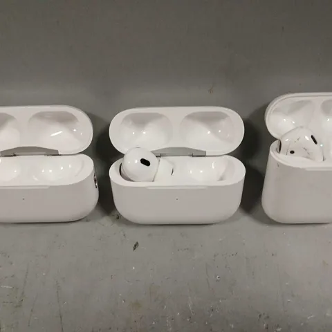 LOT OF 3 APPLE AIRPOD ITEMS TO INCLUDE CHARGING CASES AND AIRPODS