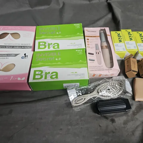 APPROXIMATELY 12 ASSORTED HEALTH & BEAUTY PRODUCTS TO INCLUDE BRA SEXY INVISIBLE, ELECTRONIC PEDICURE TOOL, AND WYPE REFILLS ETC.