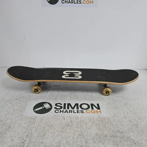 CORE SKATEBOARD – BLACK DECK WITH ASTRONAUT ARTWORK AND CORE BRANDING, YELLOW WHEELS