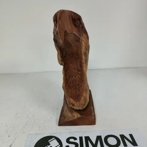ROYAL BALI CARVED WOODEN BIRD HEAD SCULPTURE ON PLINTH