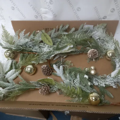 9FT PRE LIT FROSTED GARLAND WITH BAUBLES