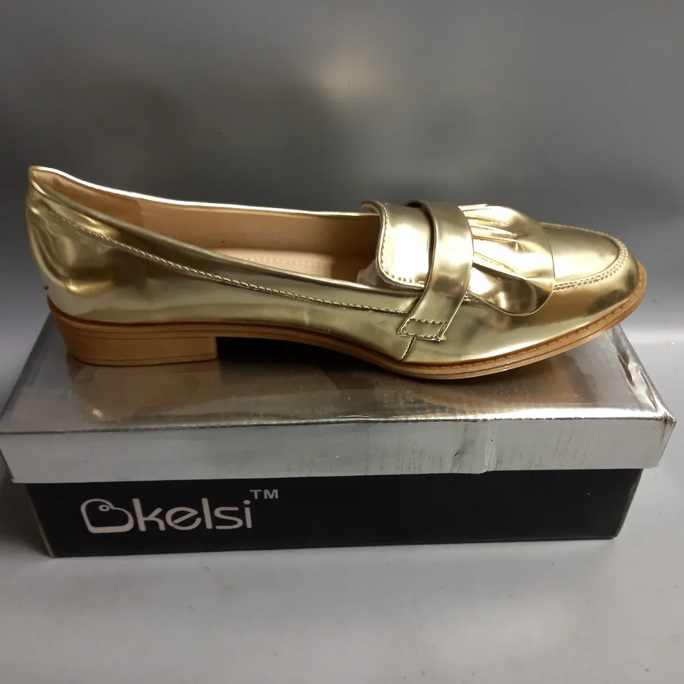 BOXED KELSI LADIES FLAT GOLD BROGUES. SIZE 8