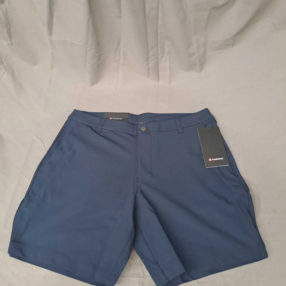 LULULEMON COMMISSION SHORT CLASSIC 7" IN NAVY SIZE 34"