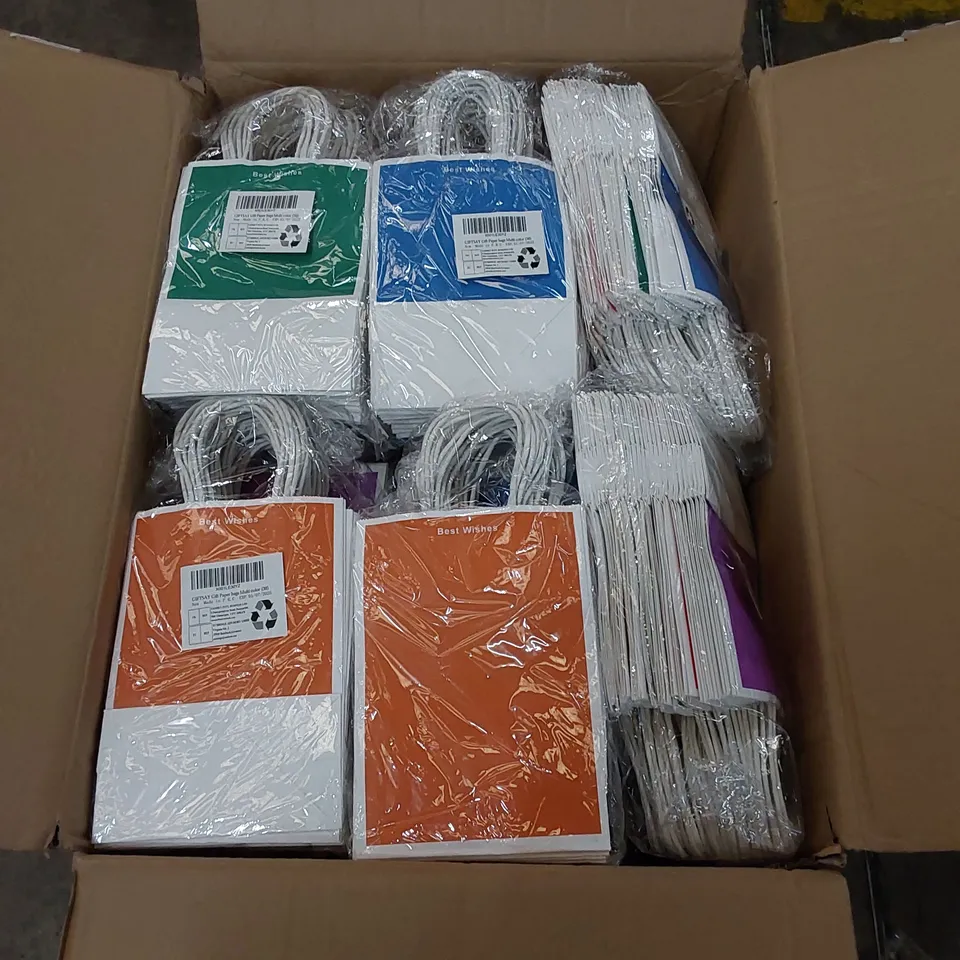 BOX CONTAING A LARGE QUANTITY OF BEST WISHES PAPER GIFT BAGS - COLOURS VARY