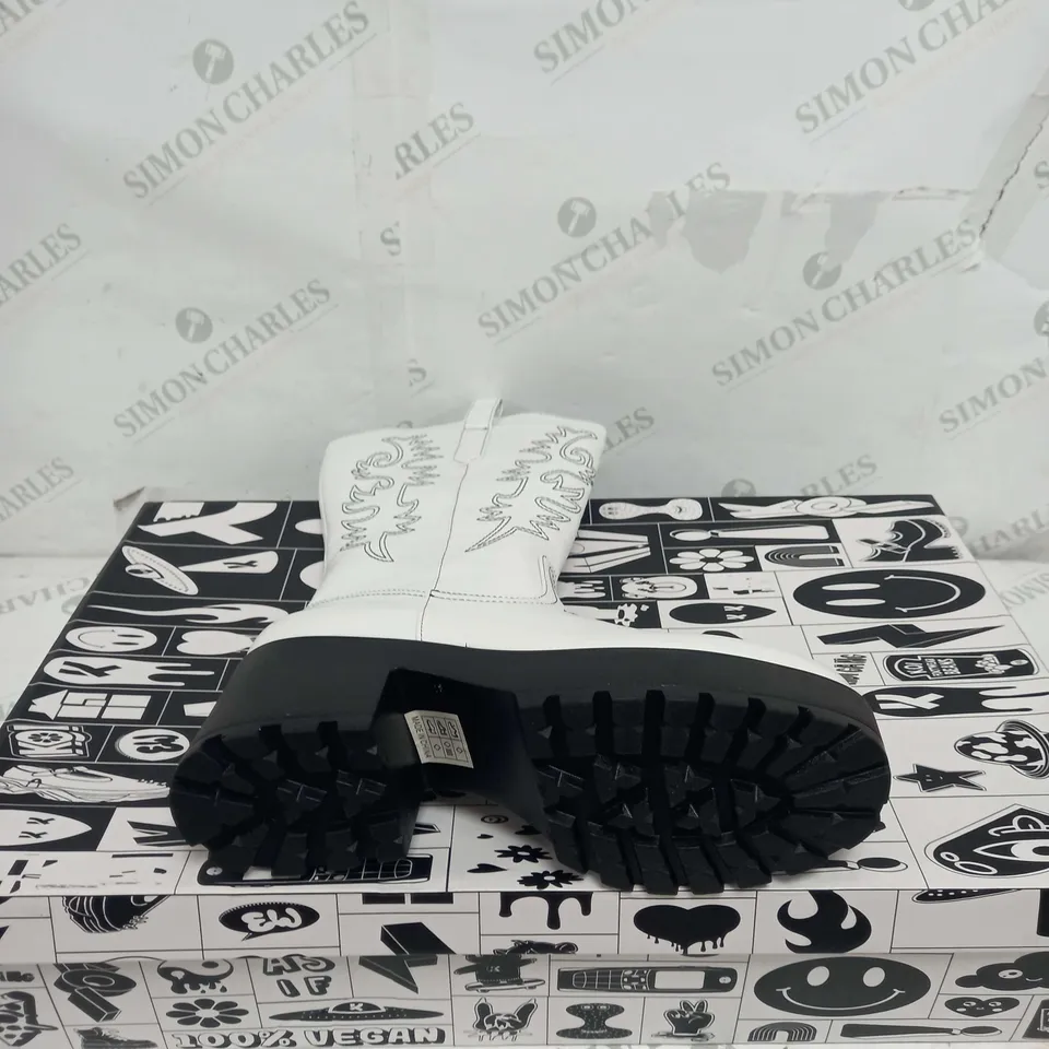 BOXED PAIR OF KOI FOOTWEAR WINTU LONG CHUNKY WESTERN BOOTS IN WHITE - SIZE 7