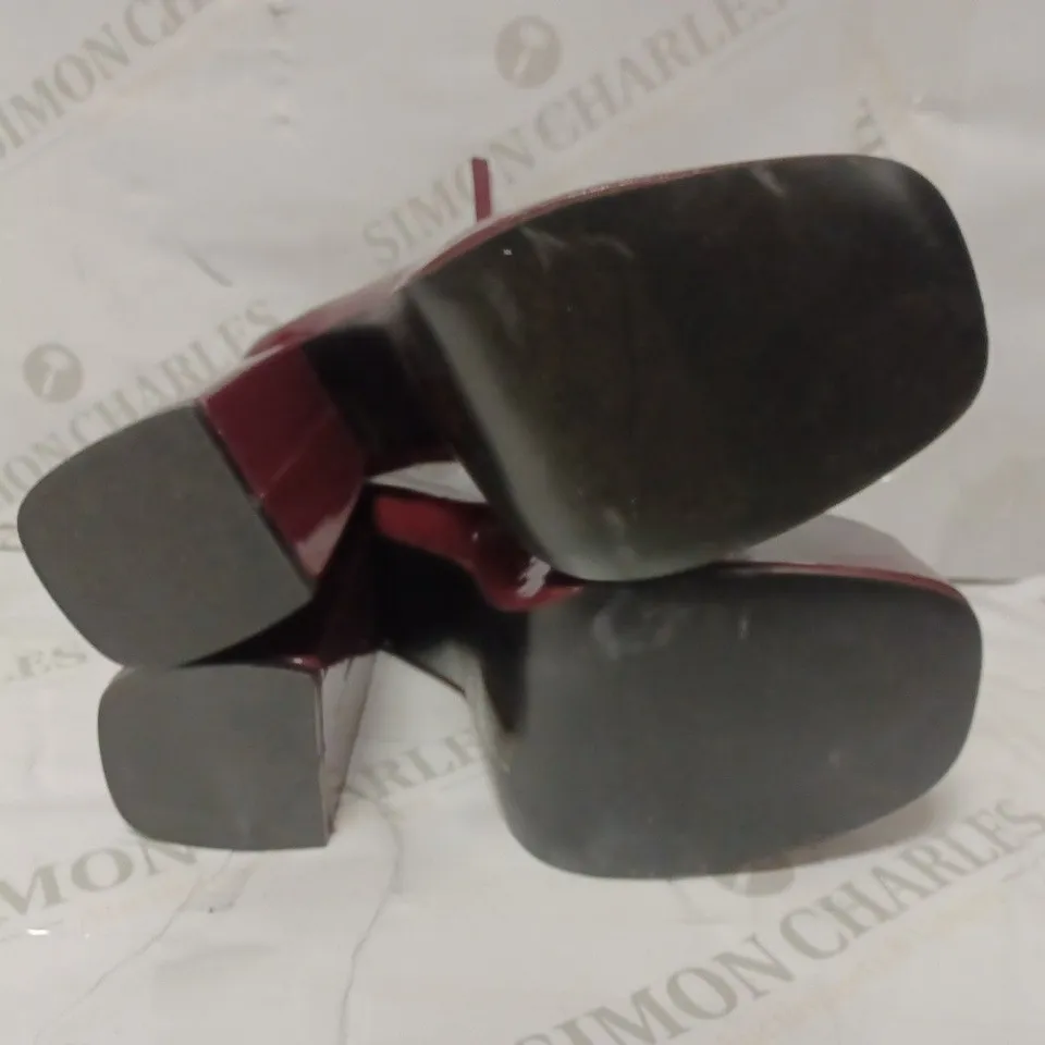 PAIR OF KOI DESIGNER VEGAN STRAP UP PLATFORM HEELS IN WINE RED - SIZE 6