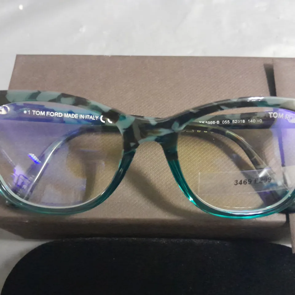 BOXED PAIR OF TOM FORD PATTERNED BLUE AND BLACK GLASSES