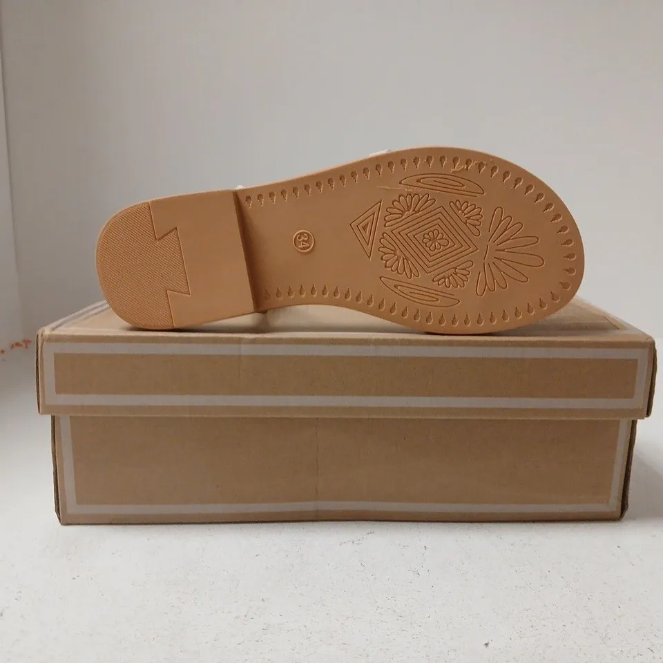BOXED PAIR OF MANLUZI OPEN TOE STRAPPY SANDALS IN BEIGE SIZE EU 34