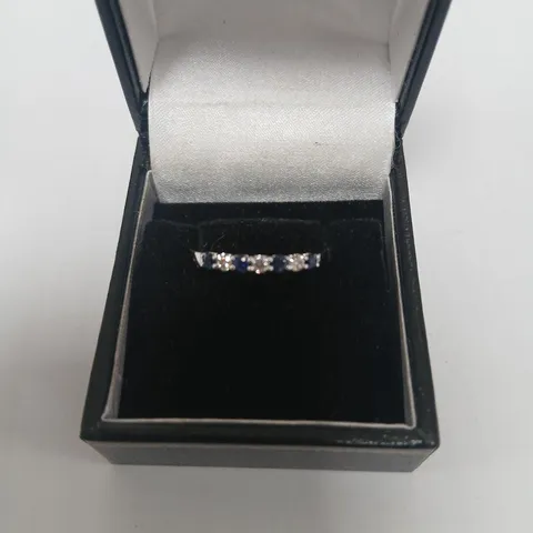 PLATINUM HALF ETERNITY RING SET WITH ALTERNATING NATURAL DIAMONDS AND SAPPHIRES