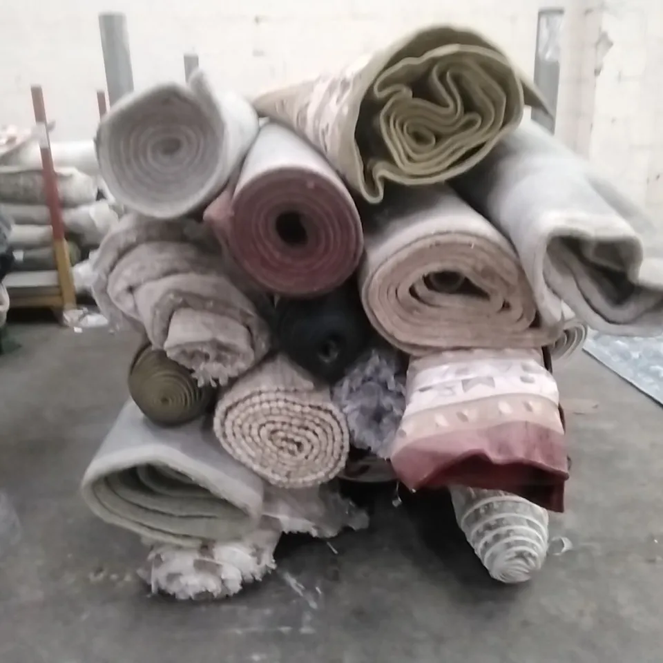 STILLAGE OF APPROXIMATELY 22 DESIGNER RUGS