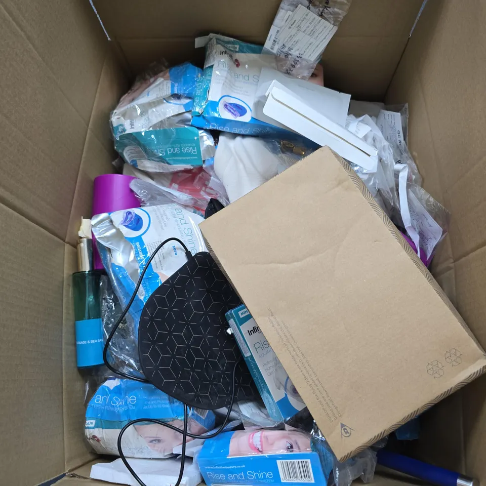 BOX OF APPROXIMATELY 30 ASSORTED ITEMS INCLUDING TEETH WHITENING KIT , DRAGON HEAD BRACELET AND VARIOUS CLOTHING ITEMS
